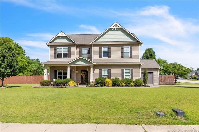 374 Boswell St, Raeford, NC 28376 - view of front of house with an attached garage and a porch