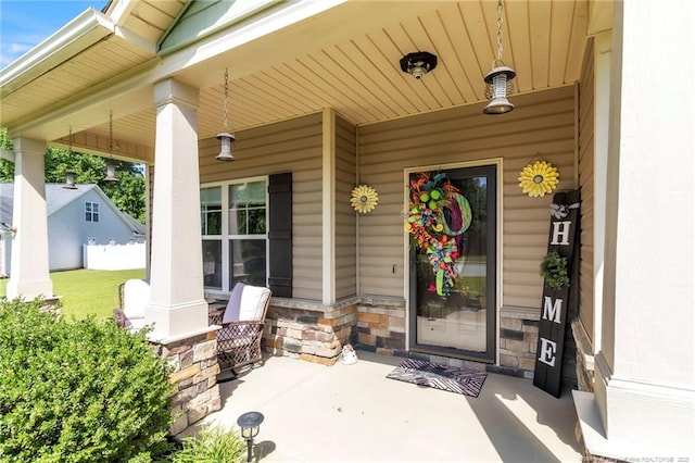 374 Boswell St, Raeford, NC 28376 - property entrance with a porch and stone siding