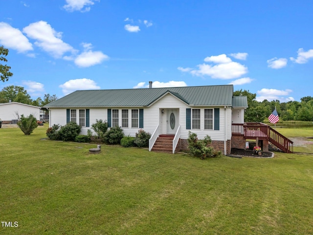 1993 Lucy Garrett Rd, Roxboro, NC 27574 - ranch-style house with metal roof, a deck, a front yard, and stairway