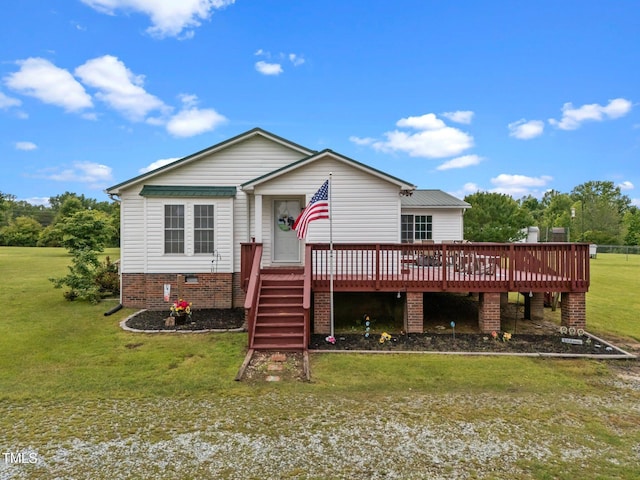 1993 Lucy Garrett Rd, Roxboro, NC 27574 - view of front of house featuring a wooden deck and a front yard