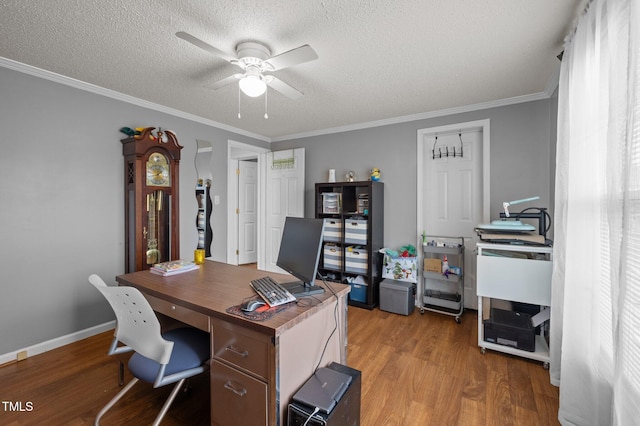 1993 Lucy Garrett Rd, Roxboro, NC 27574 - office space with wood finished floors, a ceiling fan, crown molding, a textured ceiling, and baseboards