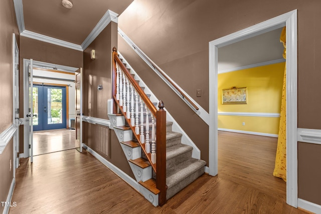 1 Gatesway Ct, Durham, NC 27707 - stairs featuring ornamental molding, wood finished floors, and french doors