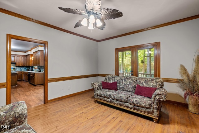 1 Gatesway Ct, Durham, NC 27707 - living area featuring light wood-type flooring, ceiling fan, and crown molding
