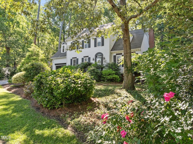 1 Gatesway Ct, Durham, NC 27707 - colonial inspired home with a garage and a chimney