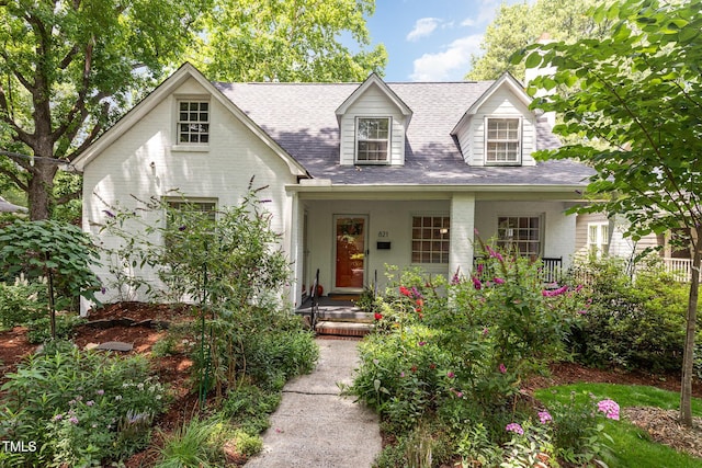 821 Onslow St, Durham, NC 27705 - new england style home featuring roof with shingles