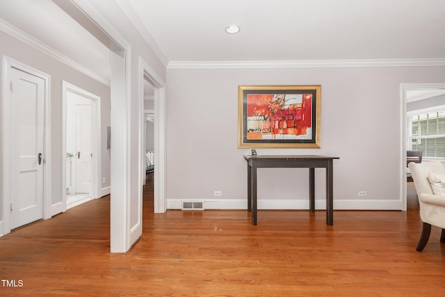 821 Onslow St, Durham, NC 27705 - hall with ornamental molding, light wood-style floors, and recessed lighting
