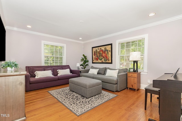 821 Onslow St, Durham, NC 27705 - living area with light wood finished floors, ornamental molding, and recessed lighting