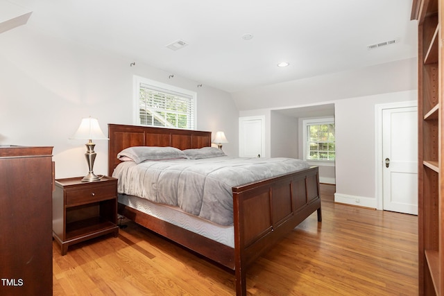 821 Onslow St, Durham, NC 27705 - bedroom featuring light wood finished floors and recessed lighting