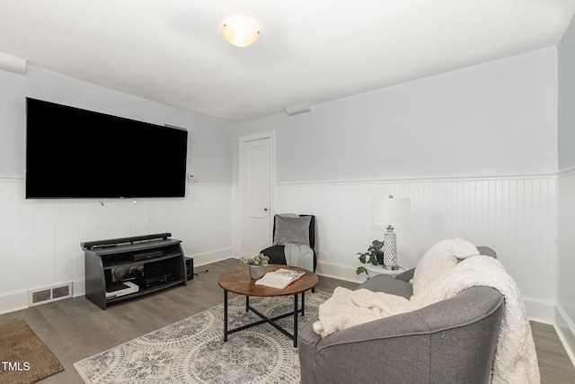 821 Onslow St, Durham, NC 27705 - living area with a wainscoted wall and wood finished floors