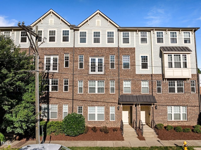 531 N Person St Unit 205, Raleigh, NC 27604 - view of front facade featuring brick siding