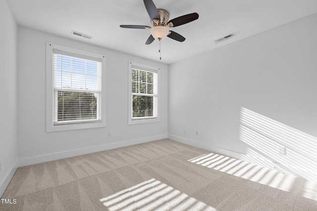 531 N Person St Unit 205, Raleigh, NC 27604 - empty room featuring baseboards, carpet floors, and a ceiling fan