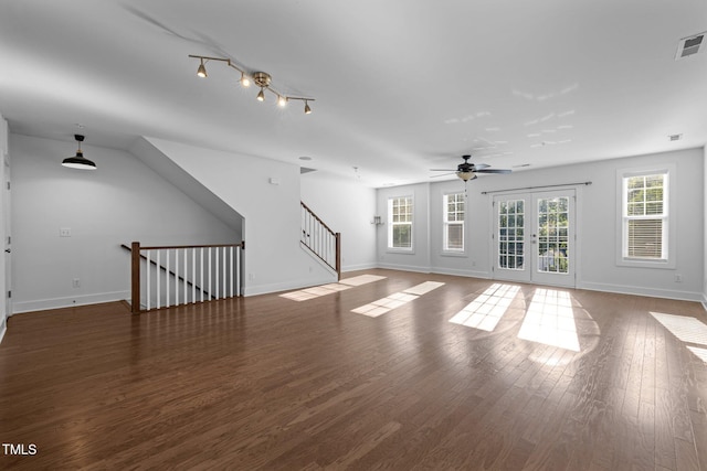 531 N Person St Unit 205, Raleigh, NC 27604 - unfurnished living room with wood finished floors, baseboards, ceiling fan, and french doors
