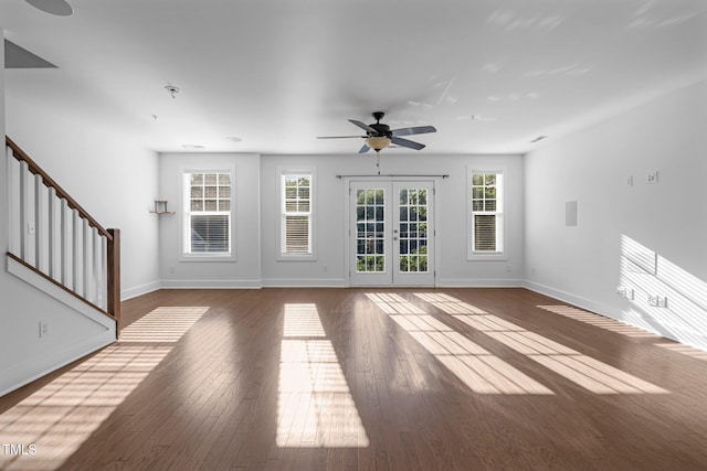 531 N Person St Unit 205, Raleigh, NC 27604 - unfurnished living room with baseboards, ceiling fan, french doors, and wood finished floors