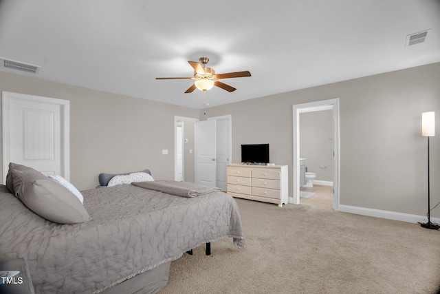 512 Barneswyck Dr, Fuquay Varina, NC 27526 - carpeted bedroom with baseboards, a ceiling fan, and ensuite bathroom