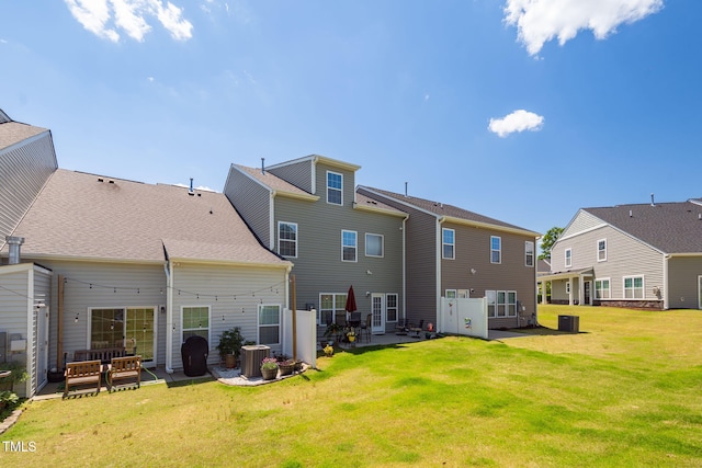 512 Barneswyck Dr, Fuquay Varina, NC 27526 - rear view of property featuring a patio, a yard, cooling unit, outdoor lounge area, and a residential view