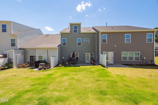 512 Barneswyck Dr, Fuquay Varina, NC 27526 - back of property with a patio, a lawn, and cooling unit
