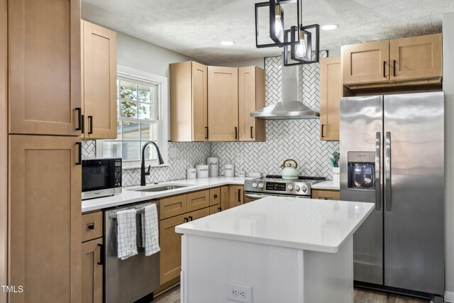 1841 Conover Dr, Fayetteville, NC 28304 - kitchen with stainless steel appliances, a sink, a textured ceiling, wall chimney range hood, and light countertops