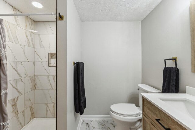 1841 Conover Dr, Fayetteville, NC 28304 - bathroom with marble look tiles, toilet, vanity, tiled shower, and recessed lighting