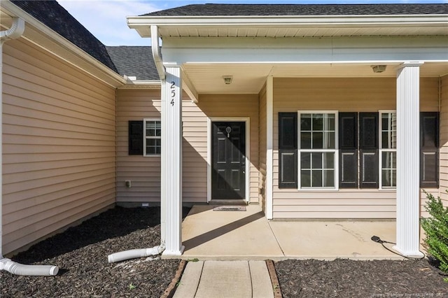 254 Blackhawk Ln, Raeford, NC 28376 - view of exterior entry with a shingled roof