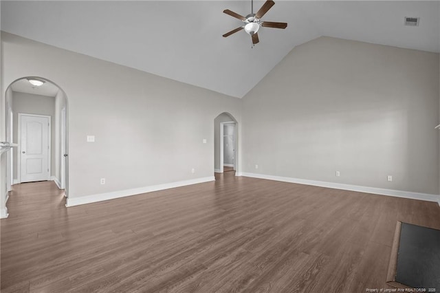 254 Blackhawk Ln, Raeford, NC 28376 - unfurnished living room with ceiling fan, arched walkways, high vaulted ceiling, dark wood-style flooring, and baseboards