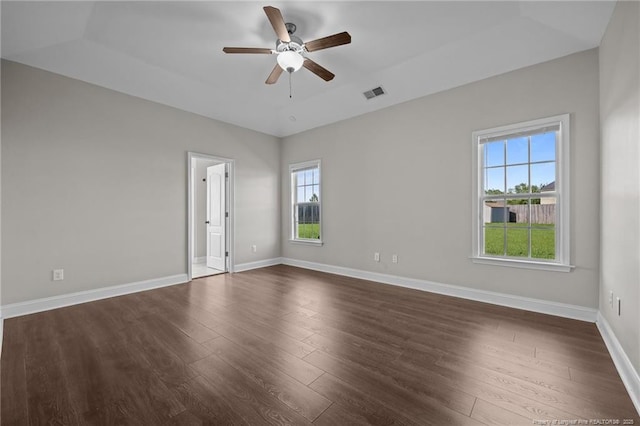 254 Blackhawk Ln, Raeford, NC 28376 - spare room with plenty of natural light, ceiling fan, dark wood-style floors, and baseboards