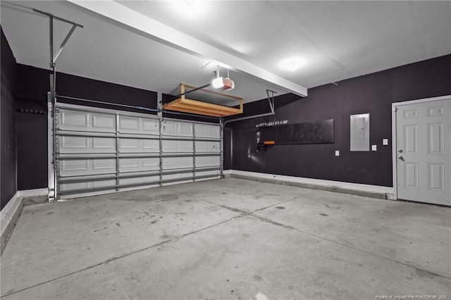 254 Blackhawk Ln, Raeford, NC 28376 - garage featuring a garage door opener, electric panel, and baseboards