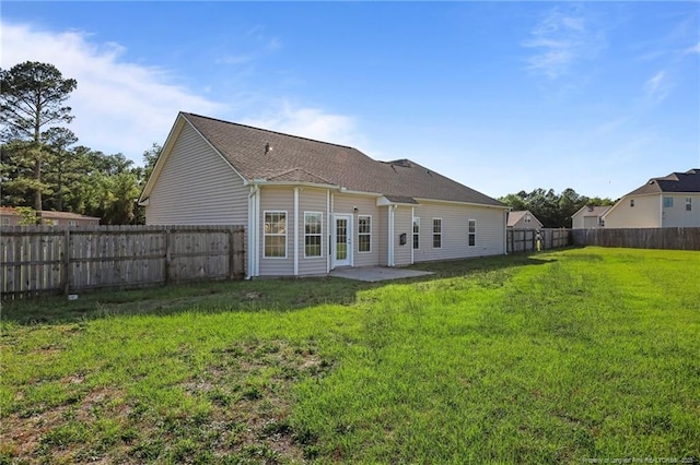 254 Blackhawk Ln, Raeford, NC 28376 - rear view of house with a patio area