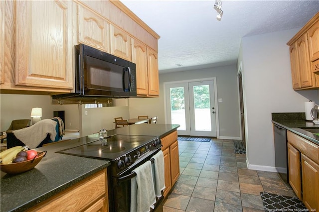 6874 Fern Creek Pl, Fayetteville, NC 28314 - kitchen featuring black appliances, baseboards, light brown cabinetry, stone finish floors, and dark stone counters