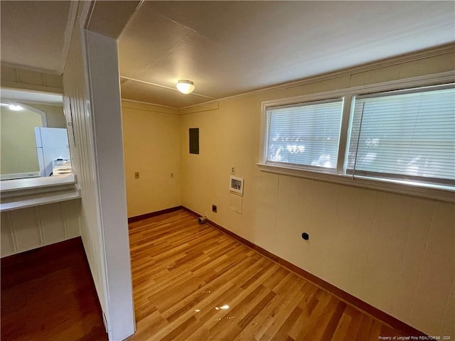 1007 Jenkins St, Lumberton, NC 28358 - empty room featuring light wood-type flooring, ornamental molding, and baseboards