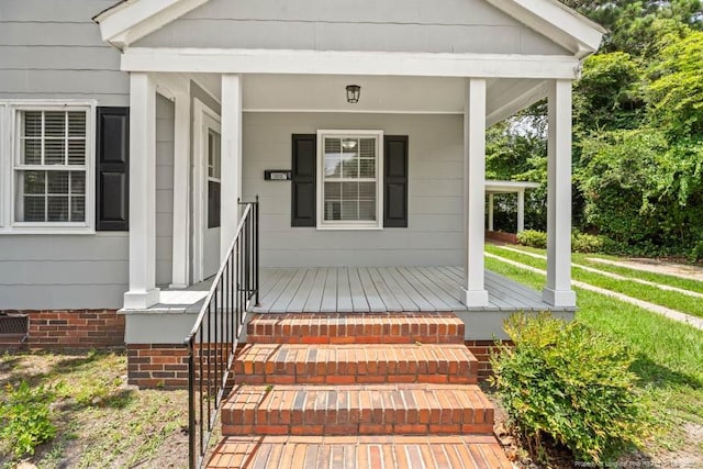 1007 Jenkins St, Lumberton, NC 28358 - view of exterior entry featuring a porch