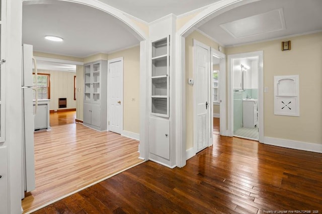1007 Jenkins St, Lumberton, NC 28358 - hall with hardwood / wood-style flooring, ornamental molding, and arched walkways