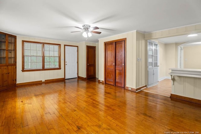 1007 Jenkins St, Lumberton, NC 28358 - unfurnished living room with wood-type flooring and ceiling fan