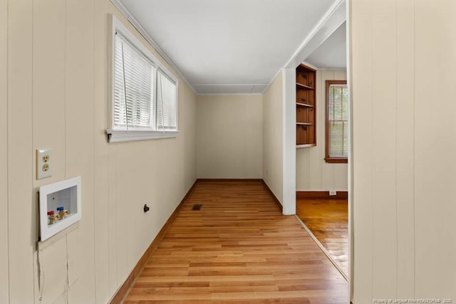 1007 Jenkins St, Lumberton, NC 28358 - hallway featuring light wood-style floors and baseboards