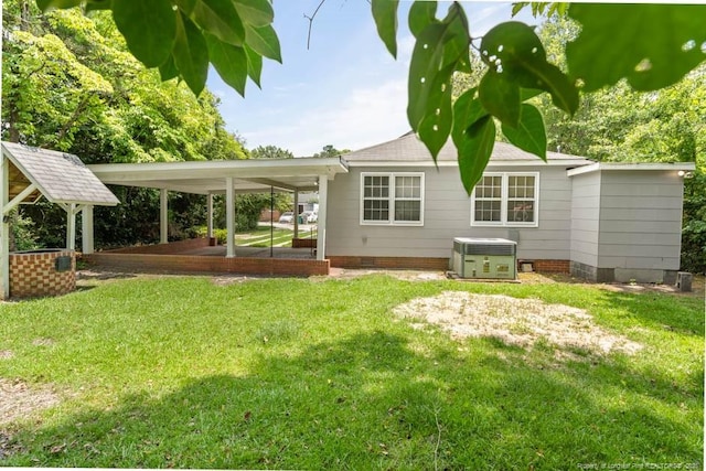 1007 Jenkins St, Lumberton, NC 28358 - back of property featuring a lawn and crawl space