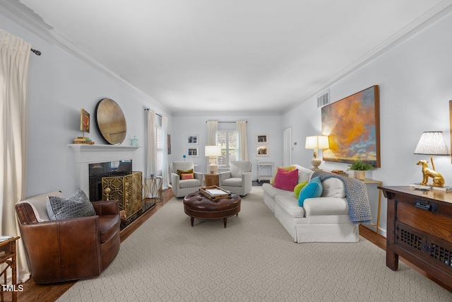 441 Fieldstone Dr, Burlington, NC 27215 - living room with wood finished floors, crown molding, and a fireplace