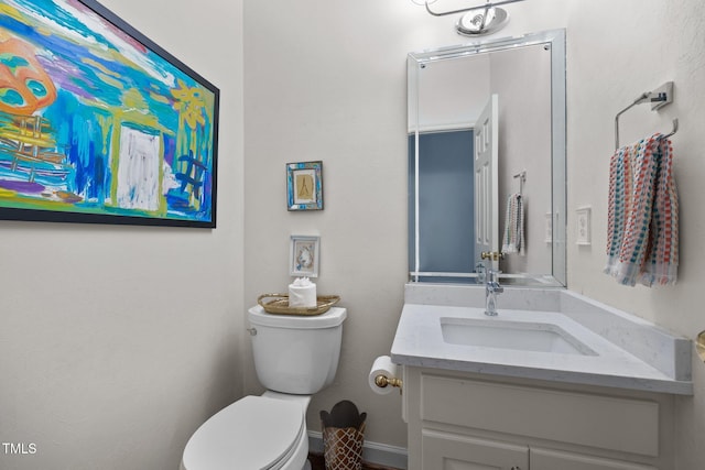 441 Fieldstone Dr, Burlington, NC 27215 - half bathroom featuring toilet and vanity