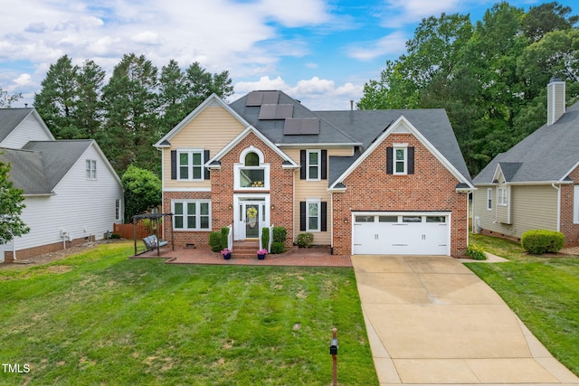 8913 Walking Stick Trl, Raleigh, NC 27615 - traditional-style home featuring brick siding, roof mounted solar panels, driveway, and a front lawn