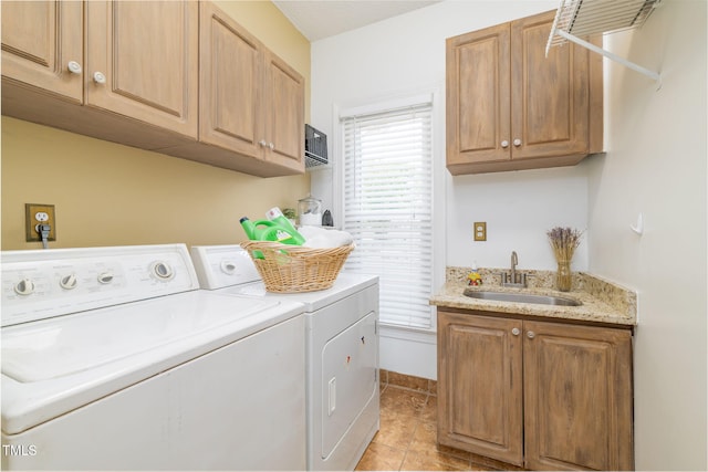 8913 Walking Stick Trl, Raleigh, NC 27615 - laundry area featuring separate washer and dryer, cabinet space, light tile patterned flooring, and wet bar