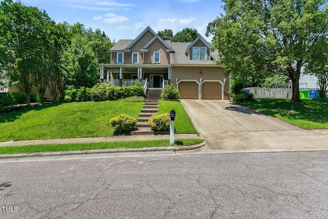 10205 Sorrills Creek Ln, Raleigh, NC 27614 - view of front of home featuring stairs, driveway, covered porch, and a garage