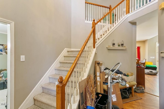 10205 Sorrills Creek Ln, Raleigh, NC 27614 - stairway with wood finished floors and a towering ceiling