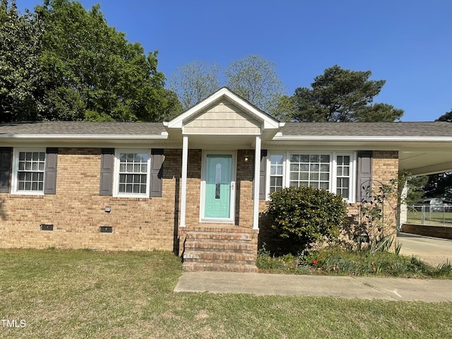 305 Briarcliff Dr, Dunn, NC 28334 - ranch-style house featuring crawl space, entry steps, brick siding, a front lawn, and an attached carport