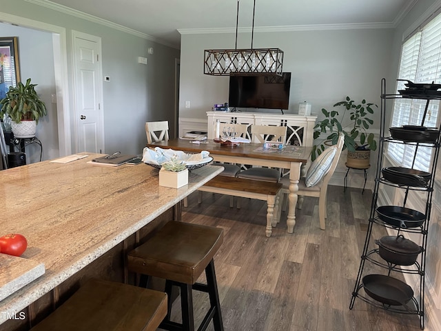 305 Briarcliff Dr, Dunn, NC 28334 - dining area with wood finished floors and crown molding