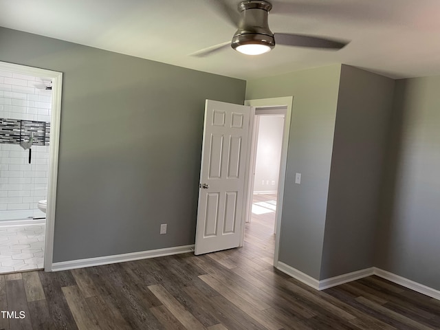 305 Briarcliff Dr, Dunn, NC 28334 - unfurnished room with ceiling fan, dark wood-style floors, and baseboards