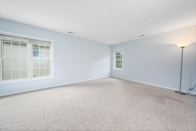 112 Sterling Ridge Way, Cary, NC 27519 - spare room featuring baseboards and carpet