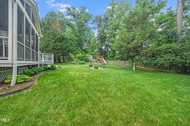 112 Sterling Ridge Way, Cary, NC 27519 - view of yard featuring a playground and view of wooded area