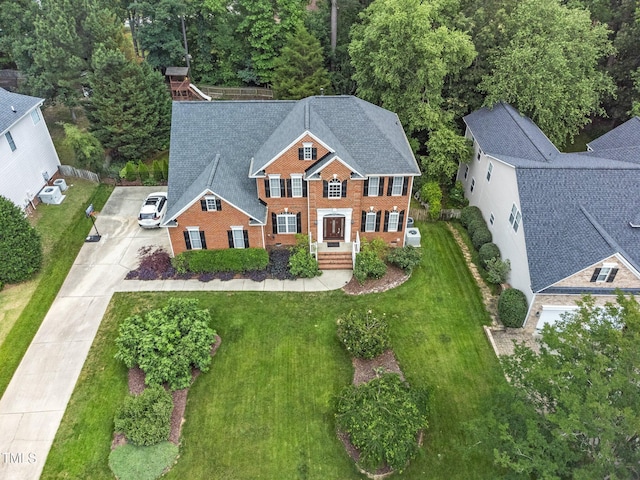112 Sterling Ridge Way, Cary, NC 27519 - view of front of property featuring concrete driveway, brick siding, and a front yard