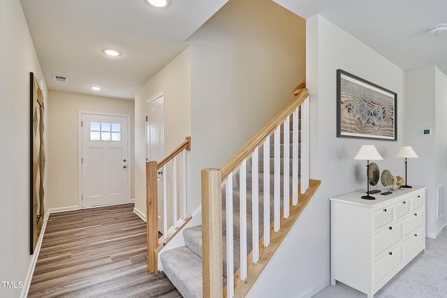 2700 Barrington Dr, Raleigh, NC 27610 - entrance foyer with stairway, light wood-style floors, recessed lighting, and baseboards