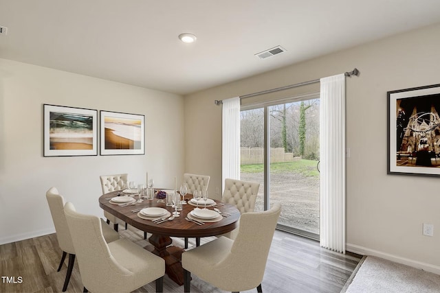 2700 Barrington Dr, Raleigh, NC 27610 - dining area featuring baseboards and wood finished floors