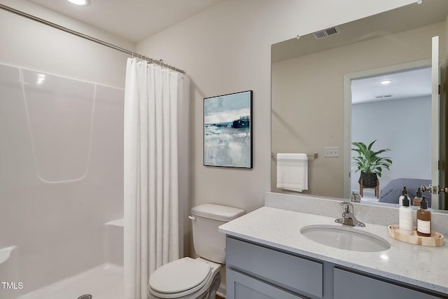 2700 Barrington Dr, Raleigh, NC 27610 - bathroom with vanity, a shower with curtain, toilet, and recessed lighting