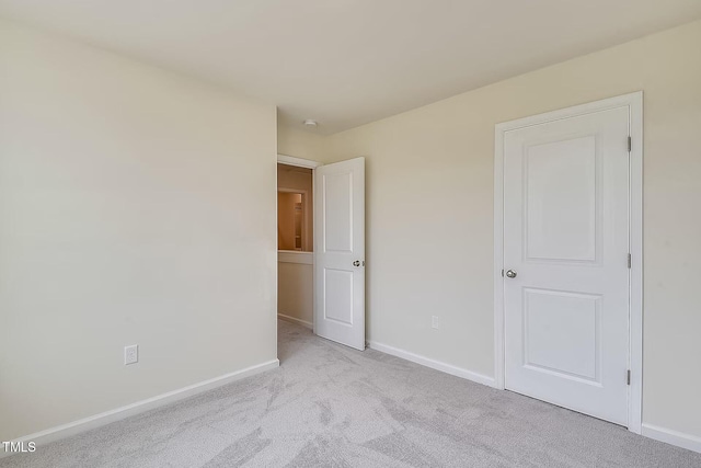 2700 Barrington Dr, Raleigh, NC 27610 - unfurnished bedroom featuring baseboards and carpet floors